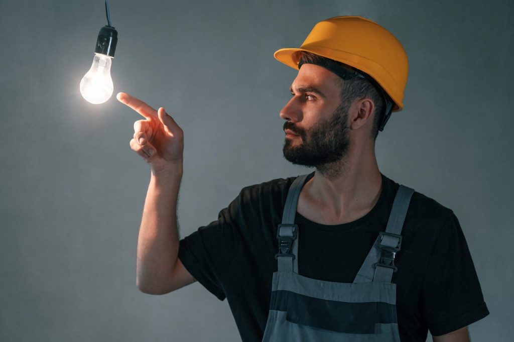 light-bulb-dark-room-man-is-making-repairs-apartment (1)